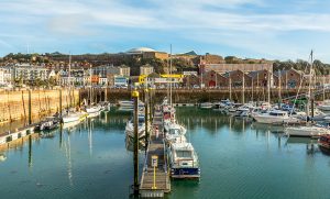 jersey saint helier 300x181 - Marina With Yacht And City In The Background, Saint Helier, Bail